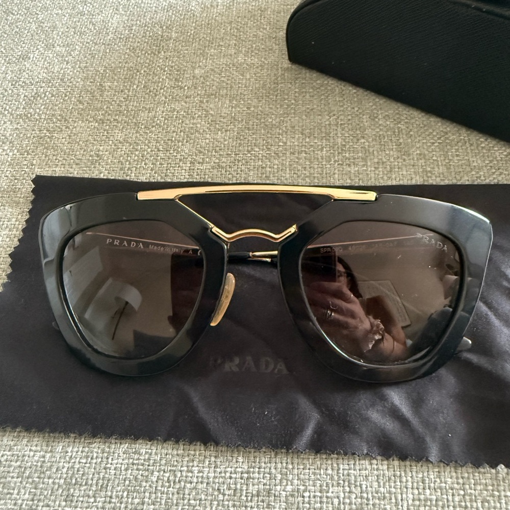 Prada Women's Sunglasses in Black with Gold Detail - Picture 2 of 6